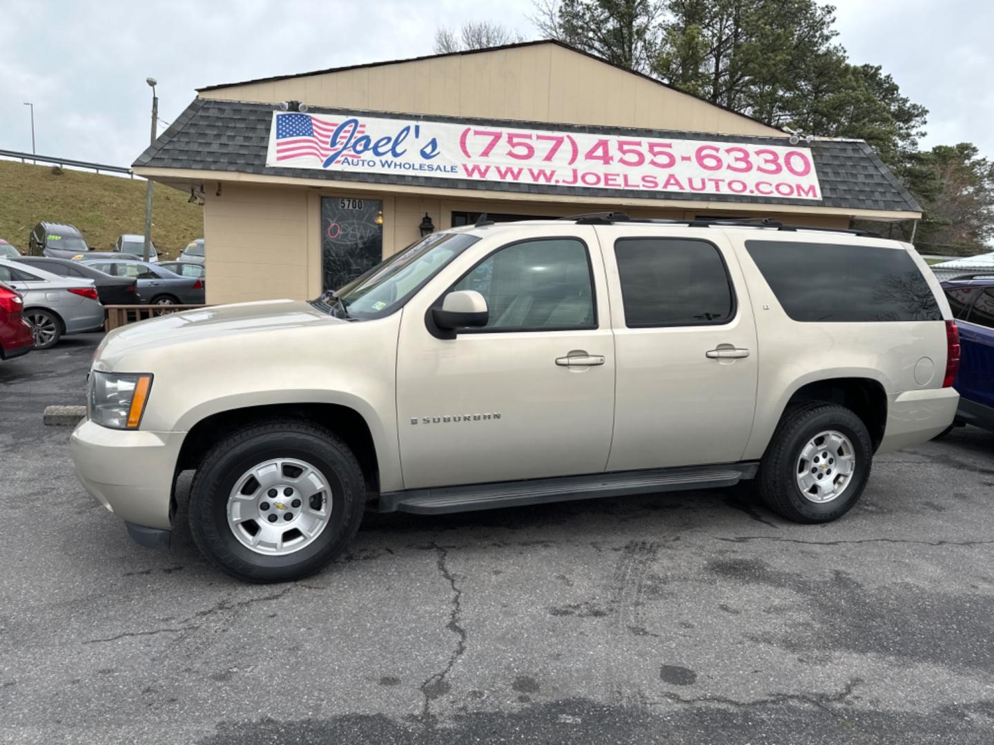 2007 Gold Chevrolet Suburban LS 1500 4WD (3GNFK163X7G) with an 5.3L V8 OHV 16V FFV engine, 4-Speed Automatic Overdrive transmission, located at 5700 Curlew Drive, Norfolk, VA, 23502, (757) 455-6330, 36.841885, -76.209412 - Photo#0